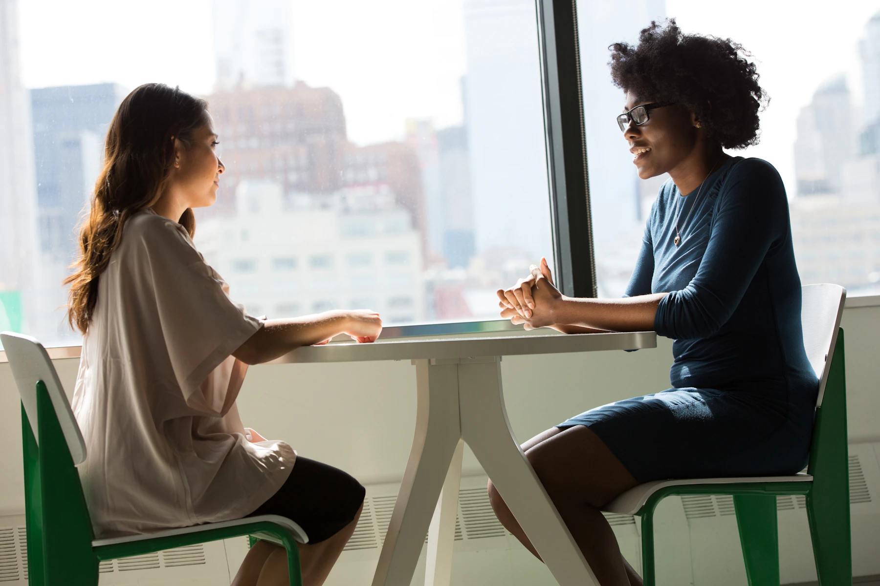 Two professionals in conversation